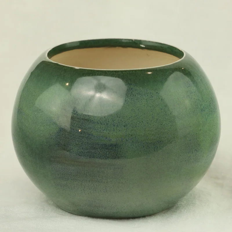 Forest green round planter
