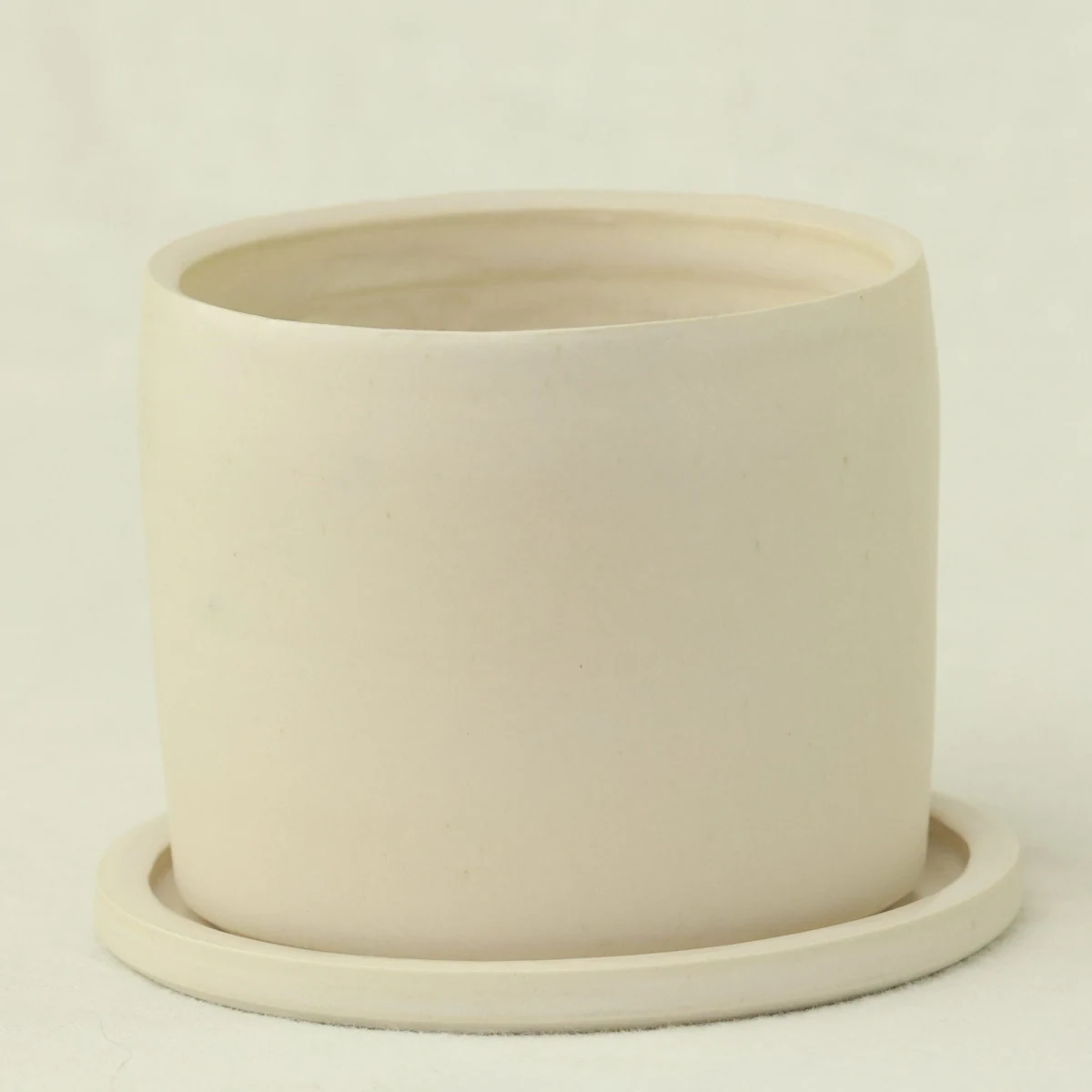 White planter and saucer